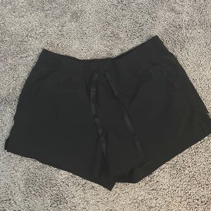 Black running shorts. Not lined.